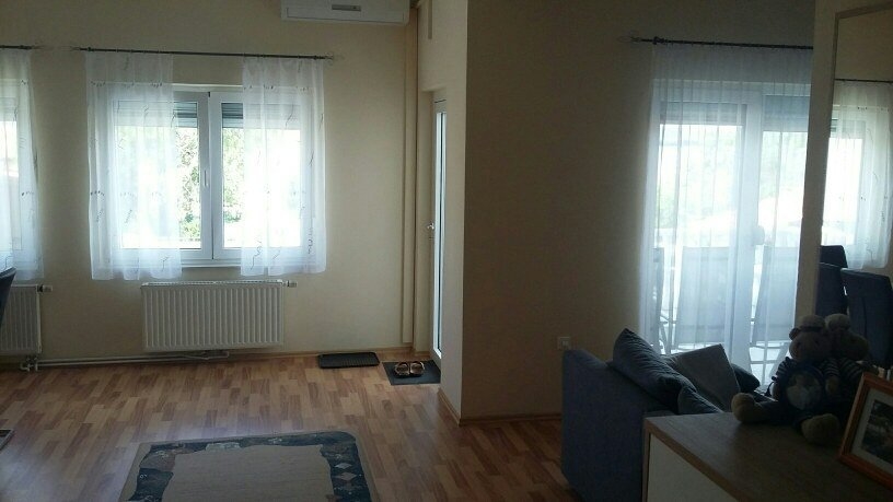 Living area with access to the terrace of property A1855, Pasman Island.