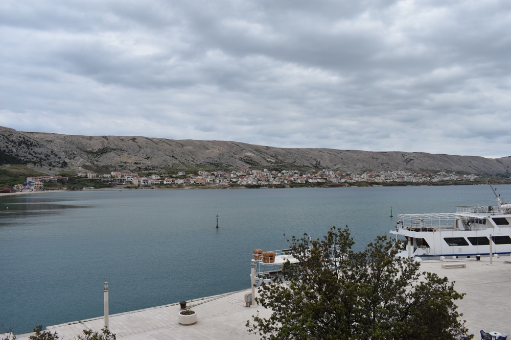 View over the bay of Pag to the town and the ferry