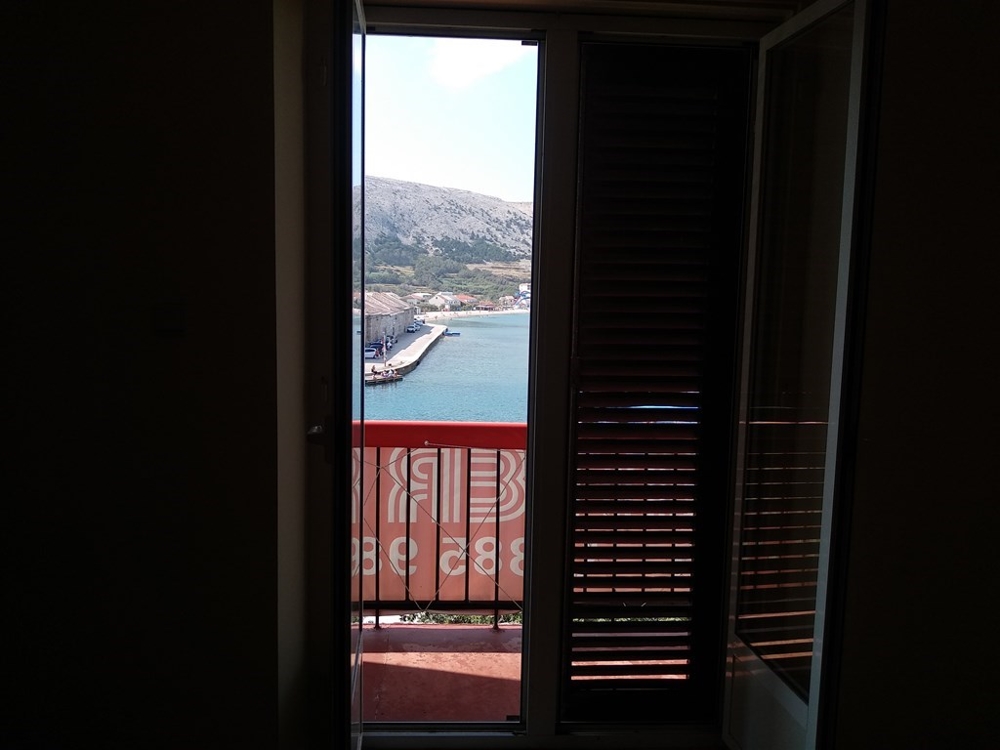 View from the living area to the terrace and the sea.