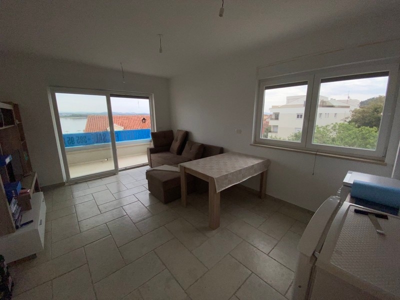 View from the living area to the terrace and the sea.