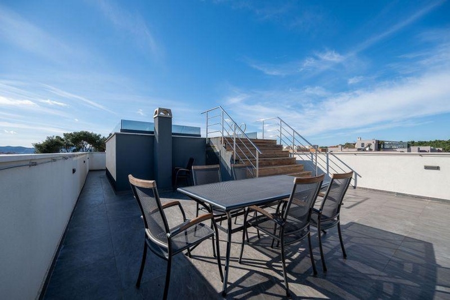 Roof terrace with seating area and view over Zadar