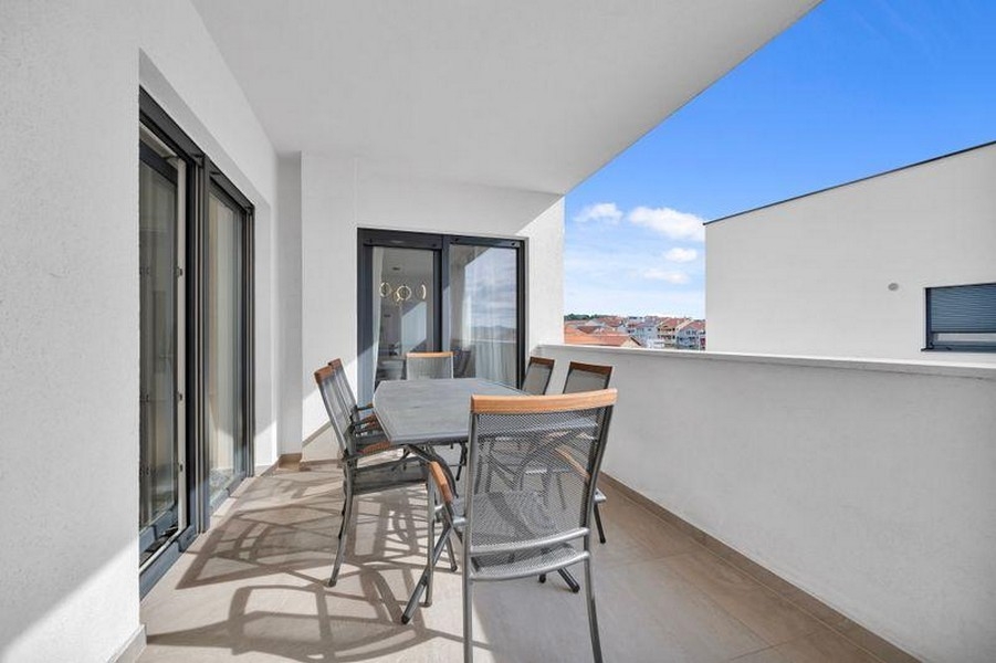 Balcony with table and chairs