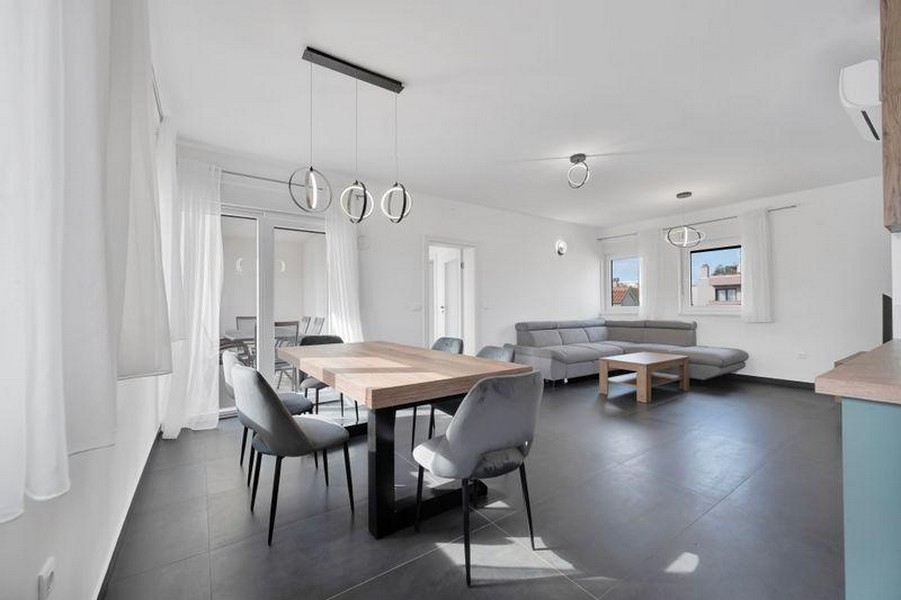 Living area with sofa and dining table