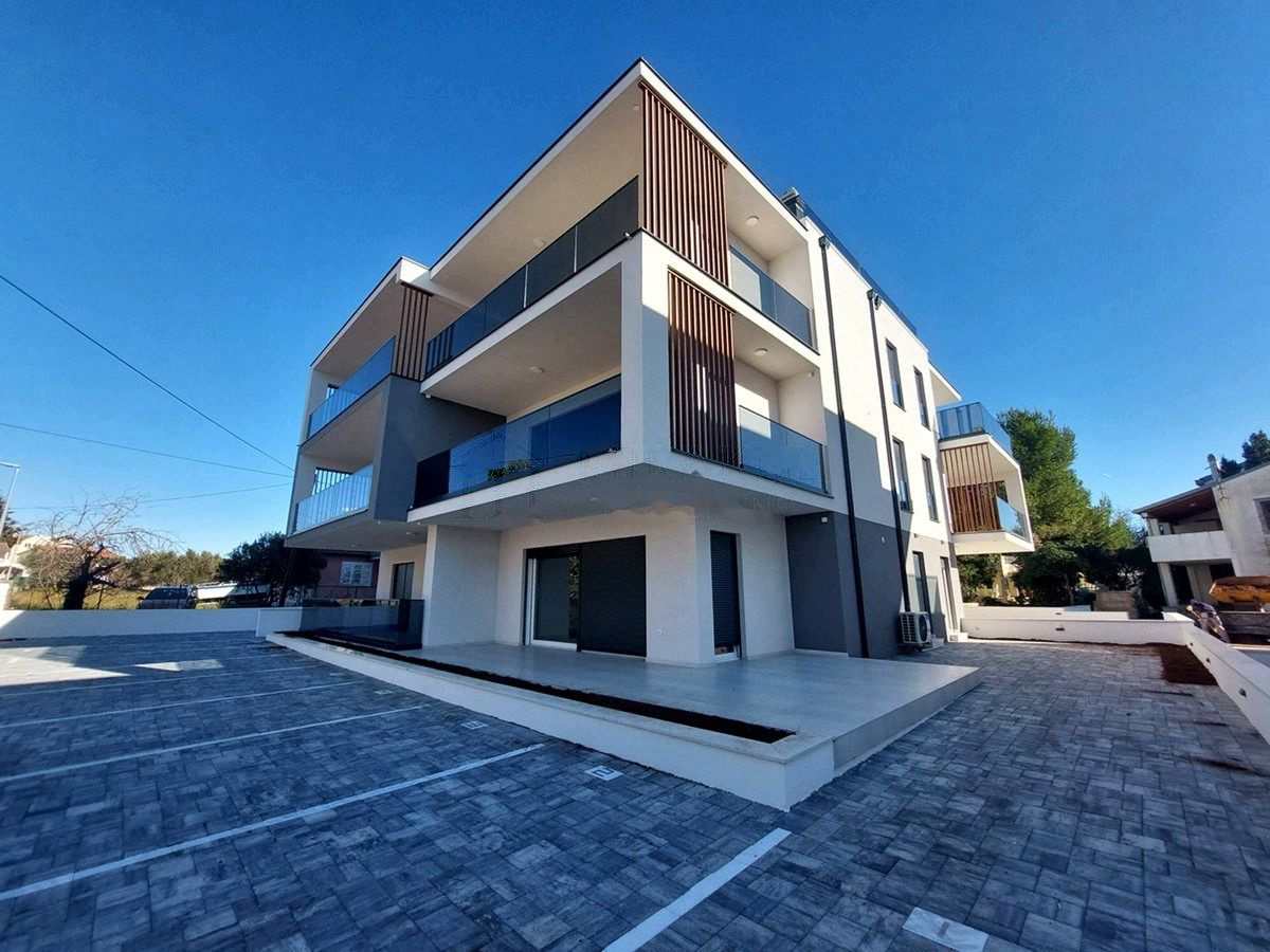 Side view of the new build with balconies and terraces