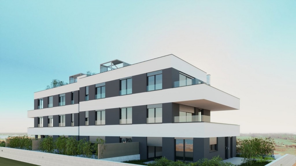 Side view of the new build with balconies and roof terraces