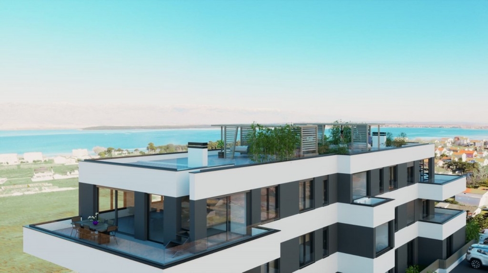Roof terrace with pergola and view of the sea