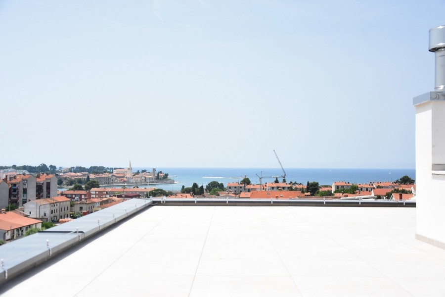 Expansive sea views from the terrace of a penthouse on the market in Istria.