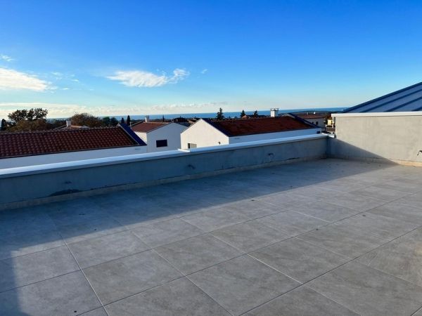 Roof terrace of an apartment in Porec with a view of the sea and the surrounding area, real estate Porec