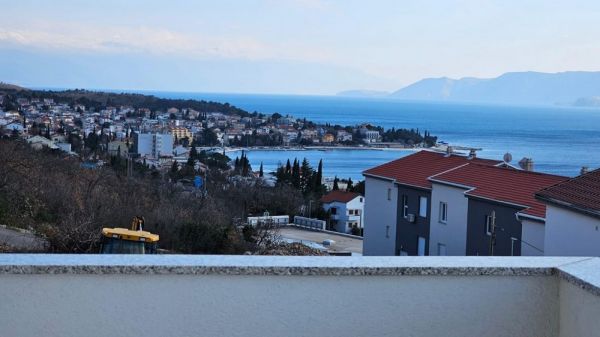 View from a balcony of Crikvenica and the sea in Kvarner Bay, Croatia, with an apartment for sale