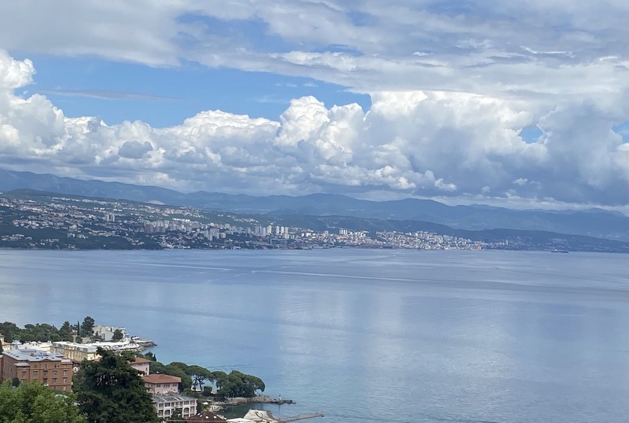 Buy apartment Croatia, Panorama Scouting - A3364, panoramic view of the city and the sea with cloudy sky.