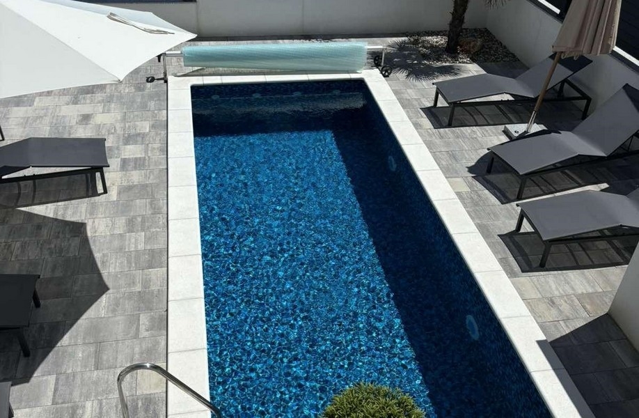 Swimming pool of property A3395, which is for sale in Croatia on the island of Krk.