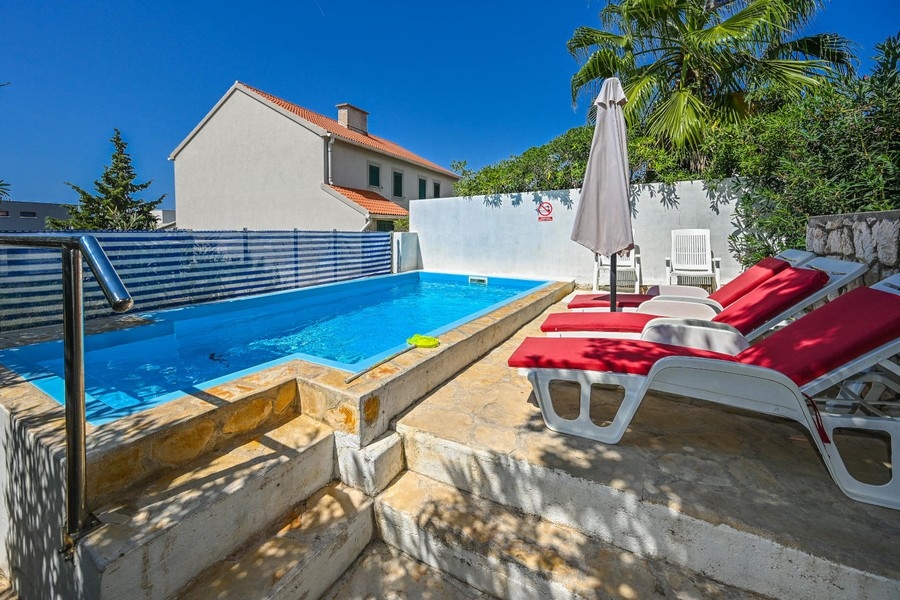 Garden and pool of property A3418 in Croatia.