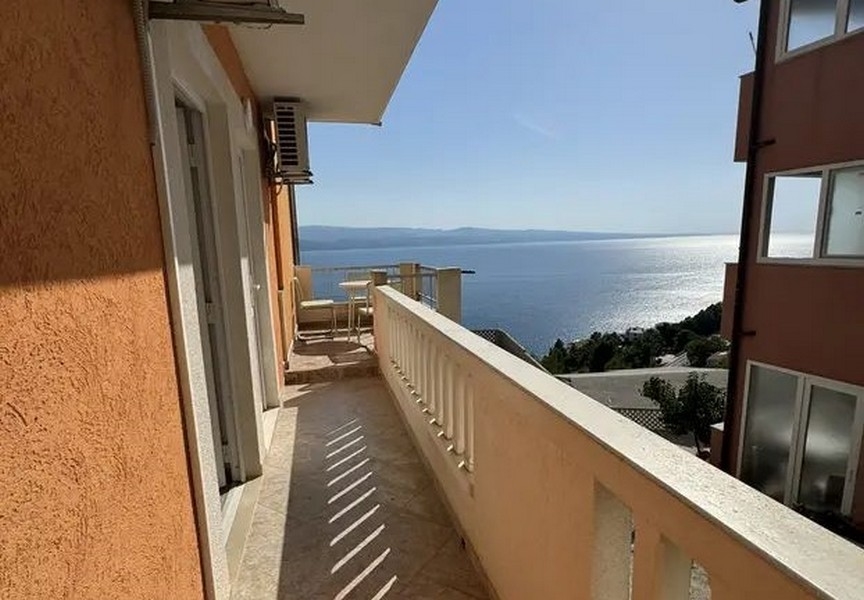 Side sea view from the balcony of property A3468 near Omis in Croatia.