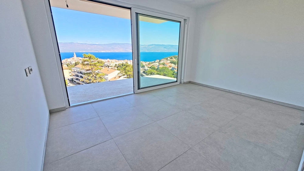 Living room with a view of the old town of Vrbnik and the Kvarner Bay, apartment A3480