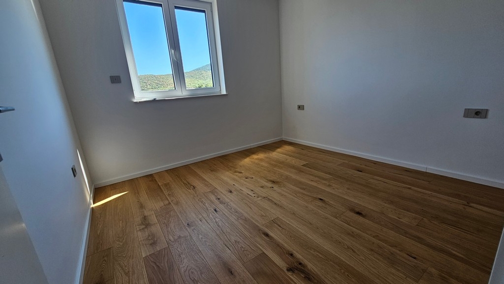 Second bedroom with parquet floors in the new apartment A3480 on the island of Krk