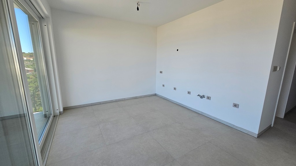Bright living and kitchen area with glass door in the new building A3480 in Vrbnik