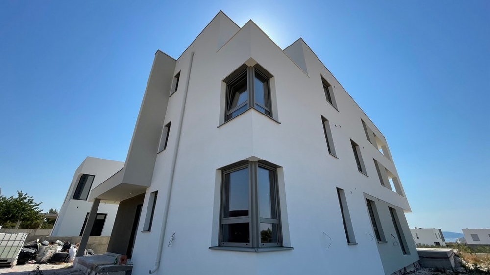 Facade of modern residential building with corner windows in Vodice - property A3577.