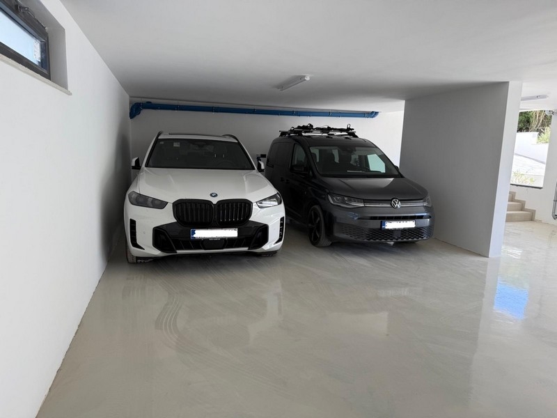 Double garage with two parking spaces