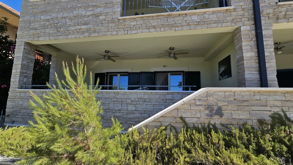 Terrace of the property A3712 directly by the sea in Croatia.