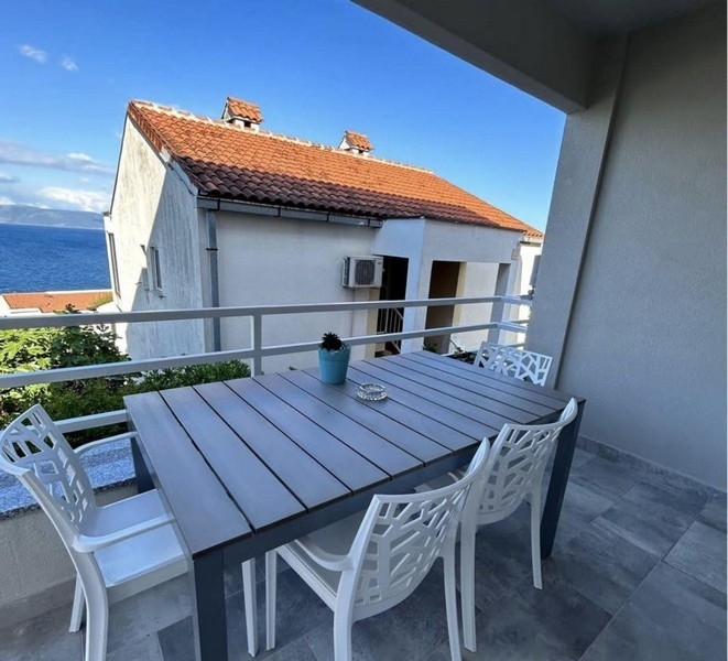 View from the balcony to the sea bank.