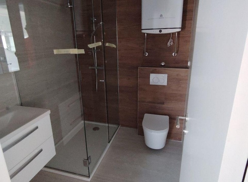Bathroom with shower, sink and toilet