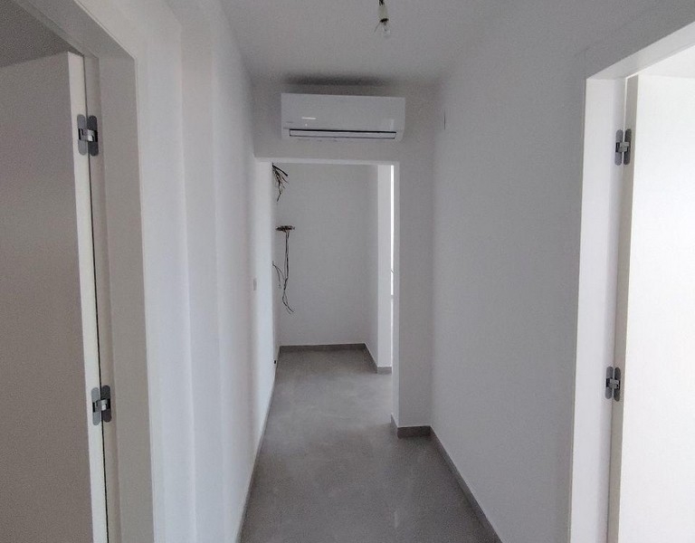 Hall with air conditioning in the new building apartment