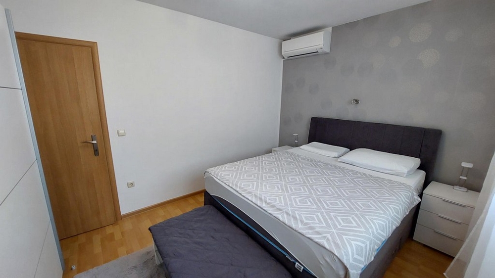 Master bedroom with double bed and air conditioning