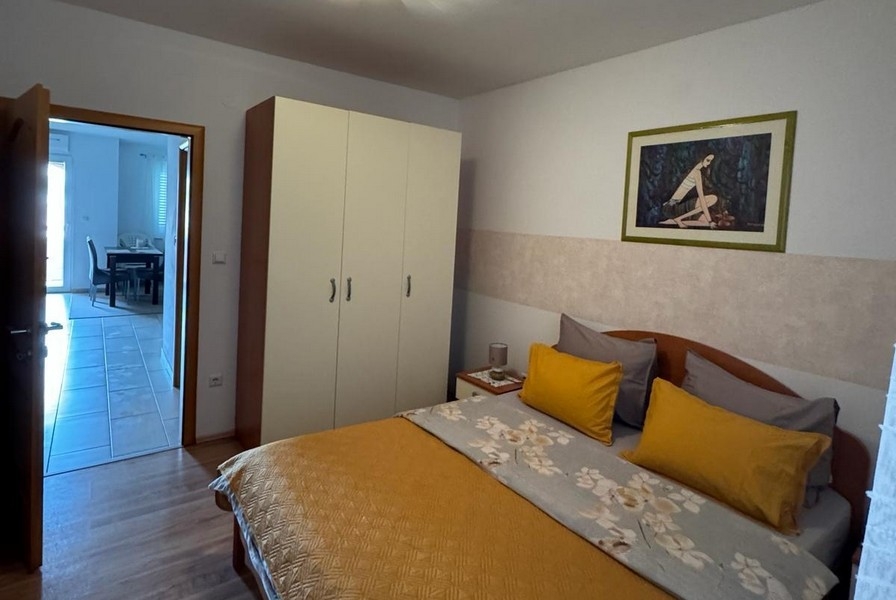 Bedroom with double bed and wardrobe