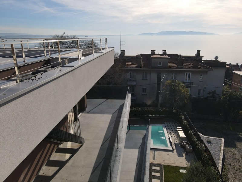 Terrace overlooking the pool and sea