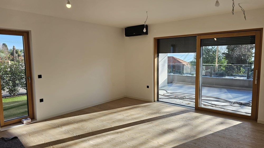 Bright living and dining room with large terrace