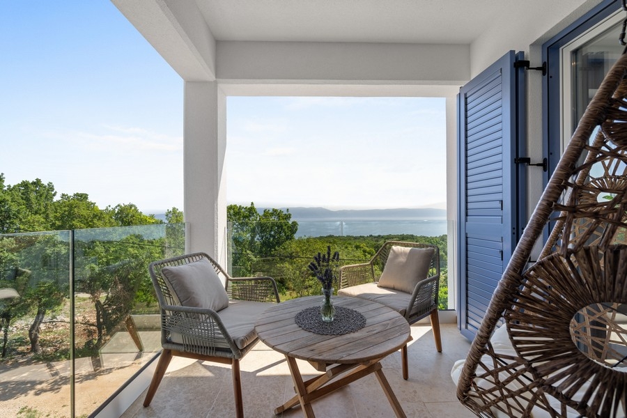 Terrace with seating area and unobstructed sea views