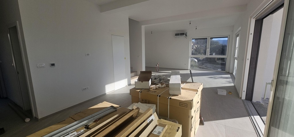 Open living area with kitchen in the new building