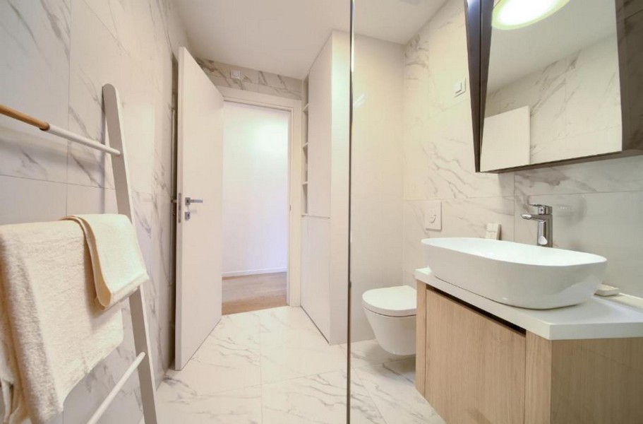 Modern bathroom with shower and vanity