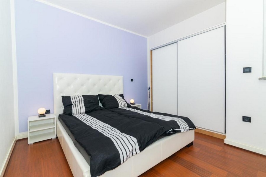 Bedroom with double bed and wardrobe