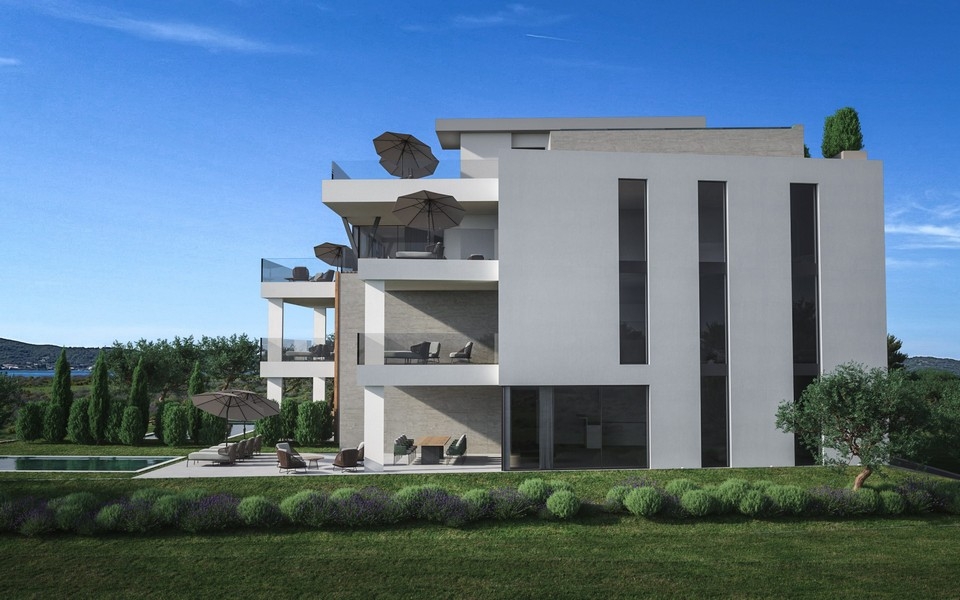 Rear view of modern new building with terraces and sea views