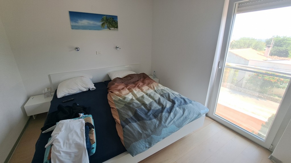 Bedroom with balcony access