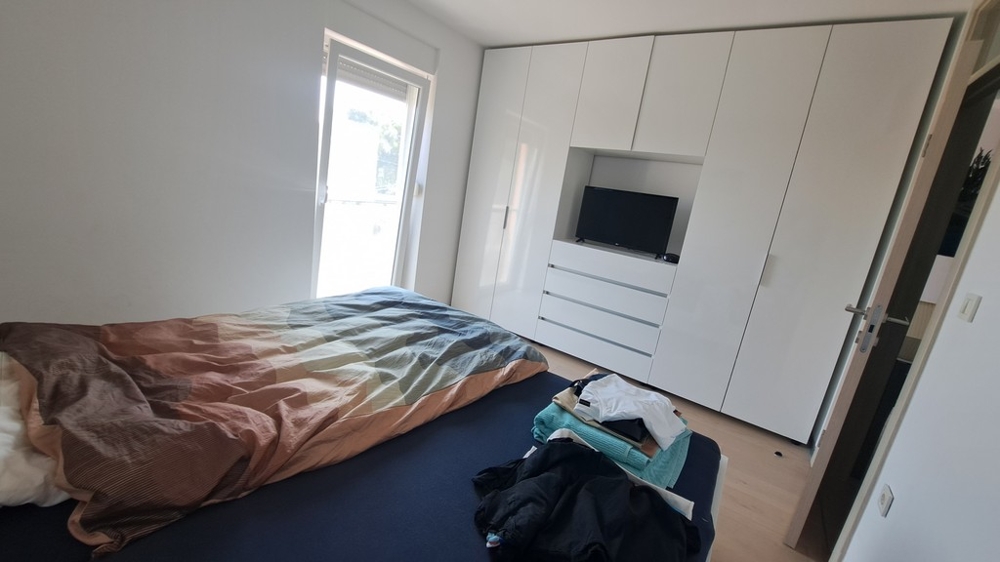 Bedroom with built-in wardrobe
