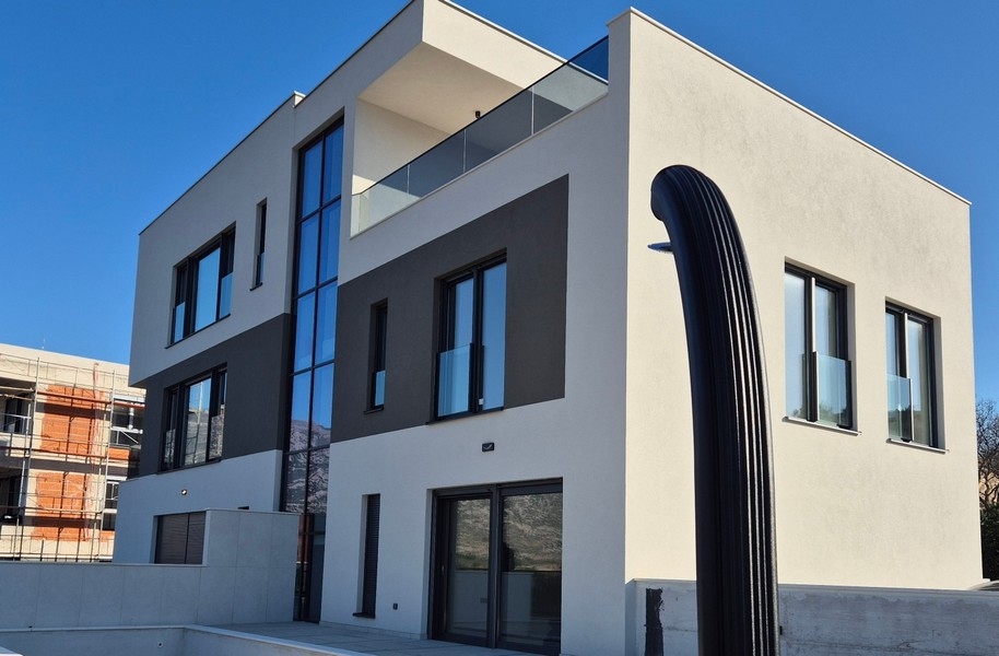 Modern new building in which the apartment is for sale.