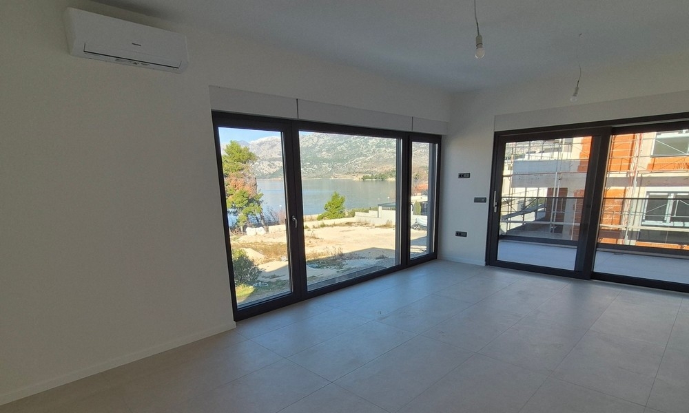 Living room with large windows and sea views