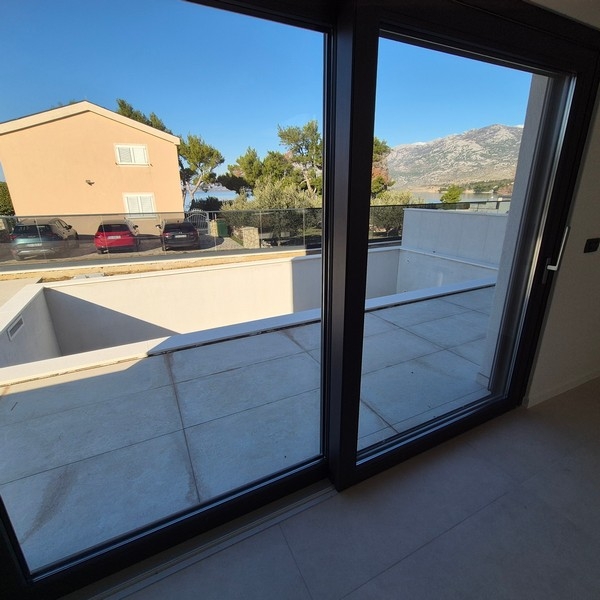 View from the living room to the terrace and the sea