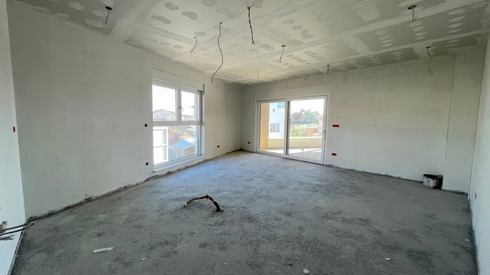 Large living area with terrace access