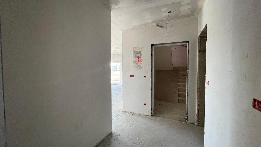 Hallway with access to the stairwell