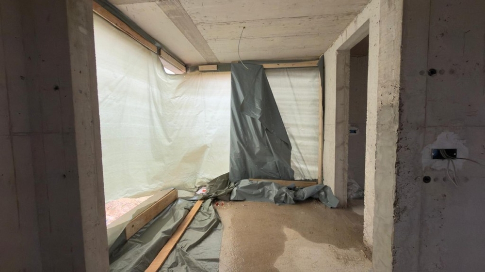 Interior view of the shell of the bedroom in a new apartment
