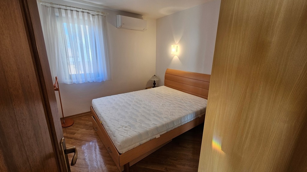 Bedroom with double bed and built-in wardrobe