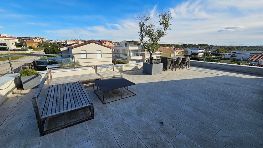 Apartment with a large roof terrace for sale in Croatia.