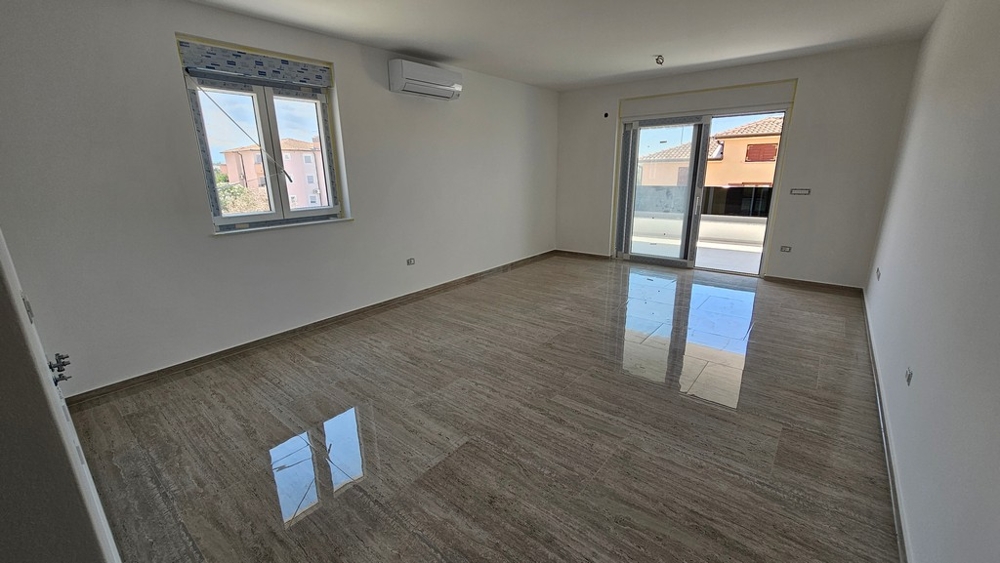 Living room and view of the terrace of property A3884, Croatia.