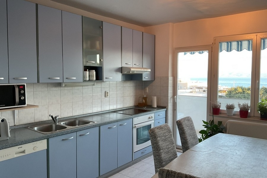 Kitchen, dining area and terrace view