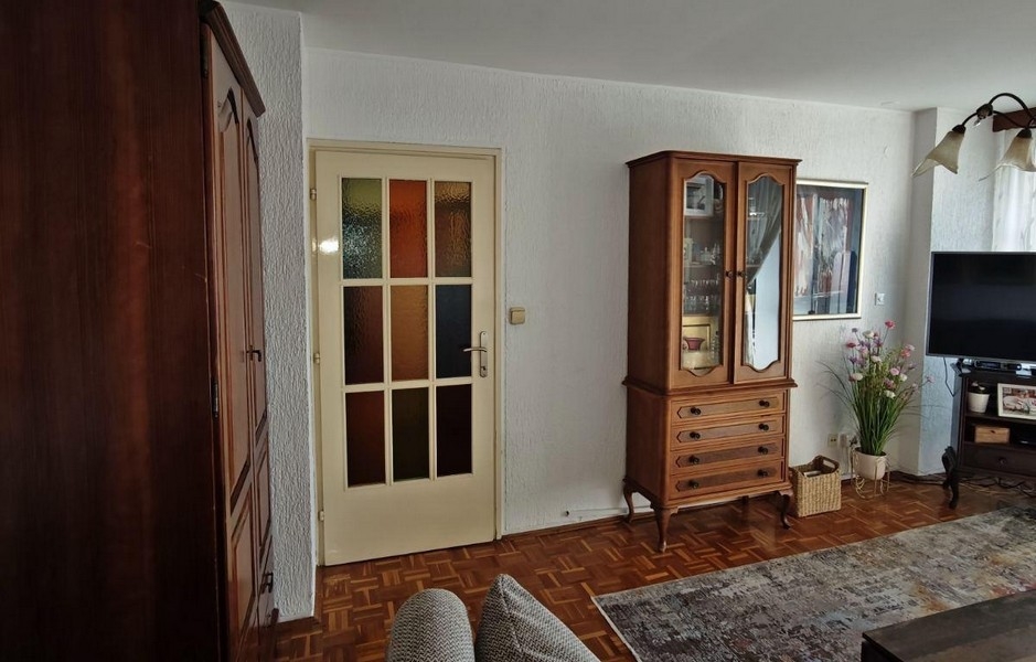 Living room with parquet floors and classic wooden furniture