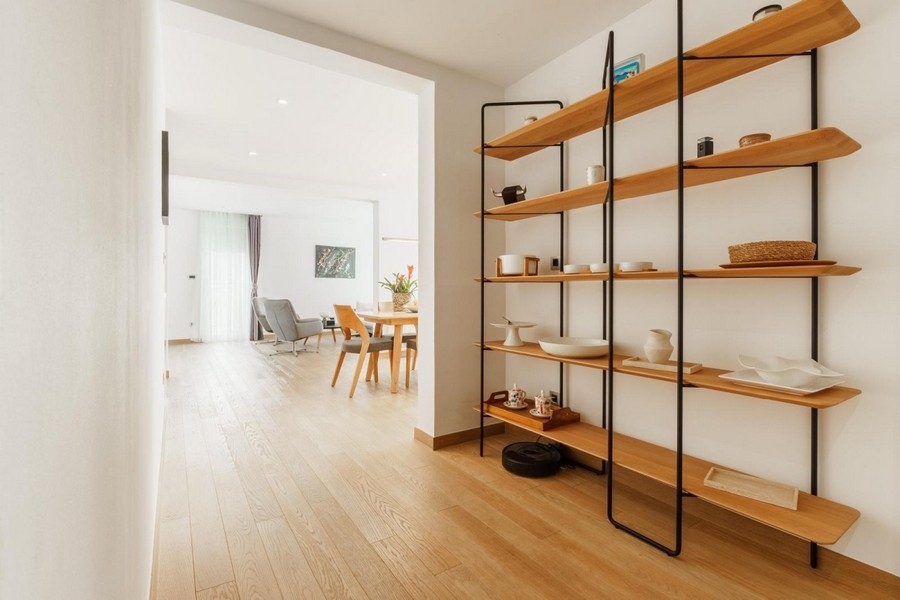 Open living area with shelves apartment Split