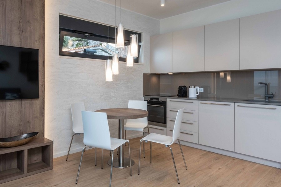 Dining area and kitchen of property A3887 in Croatia - Panorama Scouting.